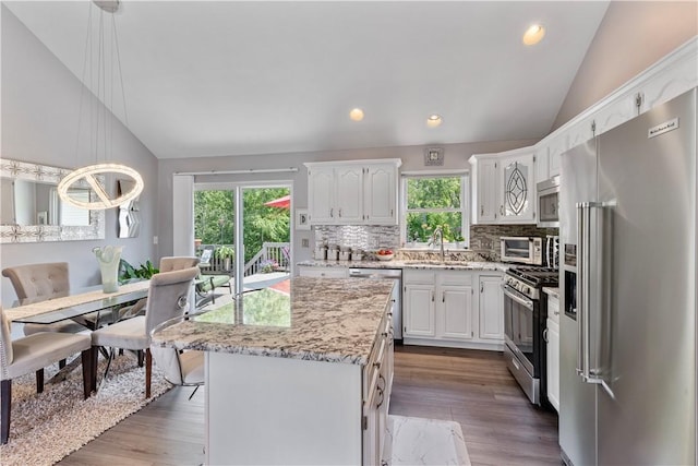 113 Seavey Highlands, Shaler, PA 15223 - kitchen featuring appliances with stainless steel finishes, lofted ceiling, plenty of natural light, white cabinetry, and recessed lighting