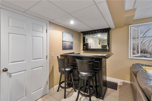 113 Seavey Highlands, Shaler, PA 15223 - indoor dry bar with baseboards, a paneled ceiling, and tile patterned flooring