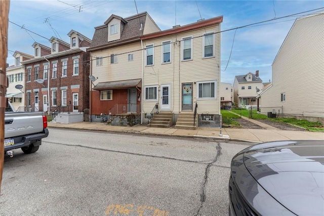 325 Taylor St, Bloomfield, PA 15224 - view of property featuring a residential view and roof with shingles