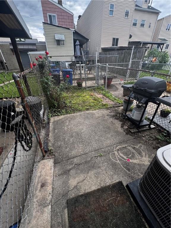 325 Taylor St, Bloomfield, PA 15224 - view of patio / terrace featuring grilling area and fence