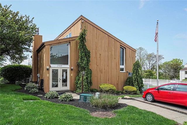 1611 Kenzie Dr, Robinson Twp Nwa, PA 15205 - view of property exterior with french doors, a chimney, and central air condition unit