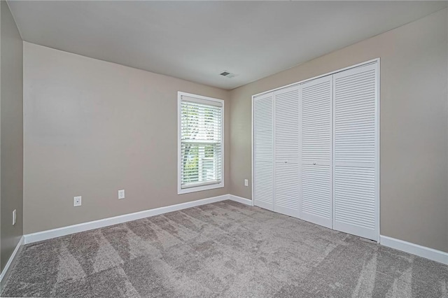 1611 Kenzie Dr, Robinson Twp Nwa, PA 15205 - unfurnished bedroom featuring baseboards, carpet, and a closet