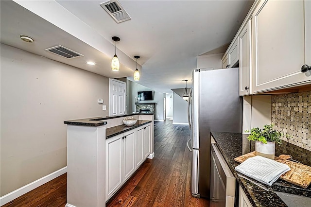 1611 Kenzie Dr, Robinson Twp Nwa, PA 15205 - kitchen with dark wood-type flooring, baseboards, white cabinets, and freestanding refrigerator