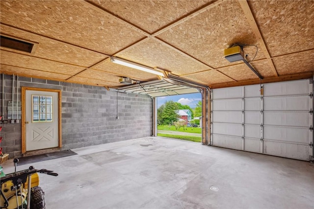 108 Gay St, Salisbury, PA 15558 - garage with a garage door opener and concrete block wall