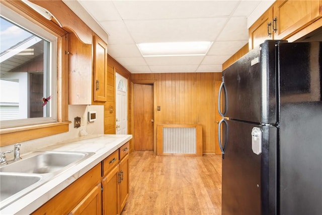 108 Gay St, Salisbury, PA 15558 - kitchen featuring freestanding refrigerator, a sink, a paneled ceiling, light countertops, and radiator