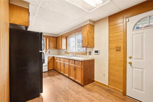 108 Gay St, Salisbury, PA 15558 - kitchen with freestanding refrigerator, light wood-style floors, a sink, light countertops, and a drop ceiling