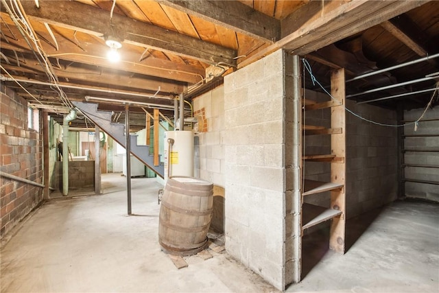 108 Gay St, Salisbury, PA 15558 - unfinished below grade area featuring gas water heater, stairs, and washer / dryer