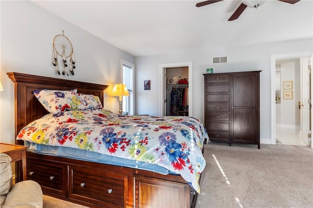 216 Settlers Ct, Peters Twp, PA 15367 - bedroom featuring light colored carpet, a walk in closet, ceiling fan, baseboards, and a closet