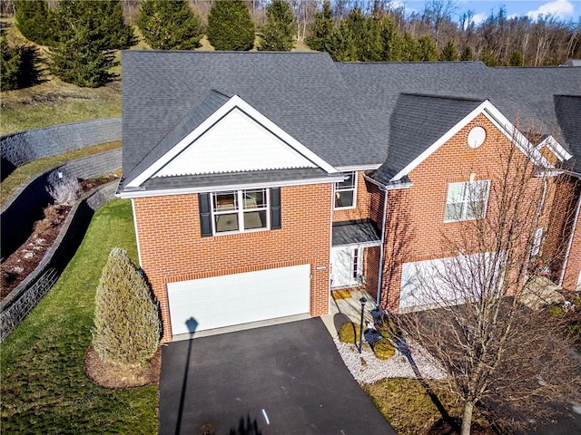 216 Settlers Ct, Peters Twp, PA 15367 - view of front facade with asphalt driveway, brick siding, an attached garage, and a shingled roof
