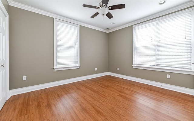 608 Broad St, Sewickley, PA 15143 - spare room featuring ceiling fan, crown molding, baseboards, and wood finished floors