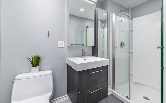 608 Broad St, Sewickley, PA 15143 - full bathroom with a stall shower, toilet, vanity, and baseboards