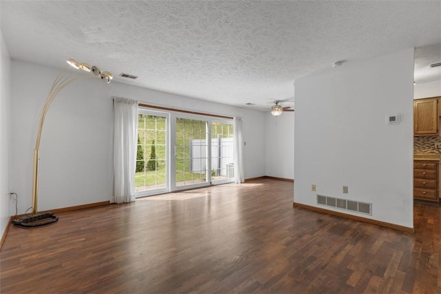 567 Brandywine Dr, Cranberry Twp, PA 16066 - unfurnished living room featuring wood finished floors, baseboards, ceiling fan, and a textured ceiling