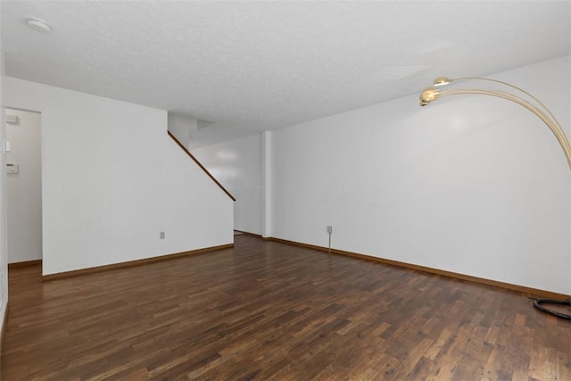 567 Brandywine Dr, Cranberry Twp, PA 16066 - unfurnished living room featuring wood finished floors, stairs, and baseboards