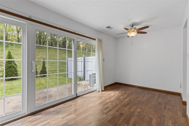 567 Brandywine Dr, Cranberry Twp, PA 16066 - doorway to outside featuring baseboards, healthy amount of natural light, wood finished floors, and a textured ceiling