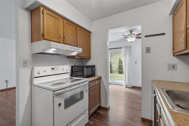 567 Brandywine Dr, Cranberry Twp, PA 16066 - kitchen featuring white electric range, under cabinet range hood, black microwave, light countertops, and ceiling fan