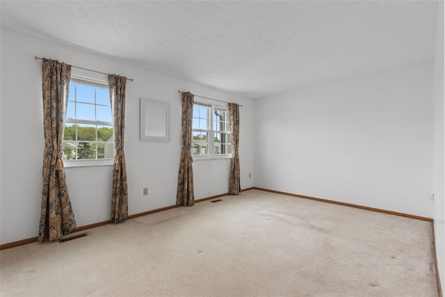 567 Brandywine Dr, Cranberry Twp, PA 16066 - spare room with light carpet, baseboards, and a textured ceiling