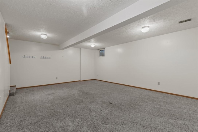 567 Brandywine Dr, Cranberry Twp, PA 16066 - finished below grade area with a textured ceiling, carpet floors, and baseboards