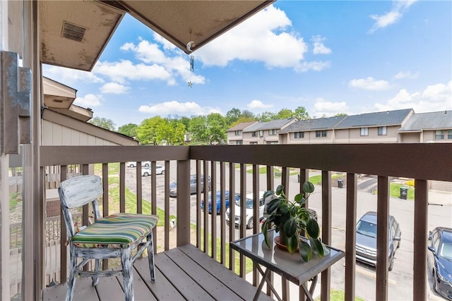 balcony featuring a residential view