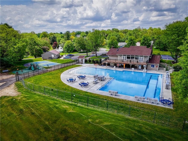 community pool with a deck