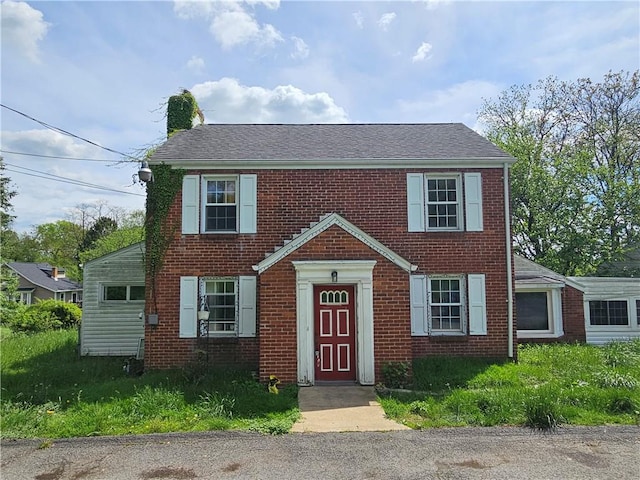 256 Duff Rd, Penn Hills, PA 15235 - view of front of property with a chimney and brick siding