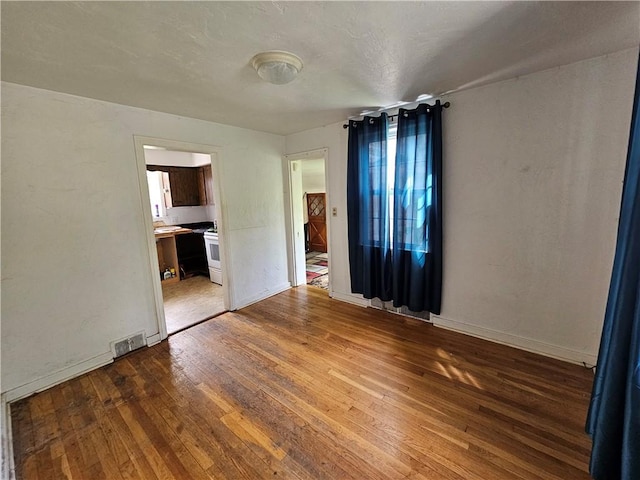 256 Duff Rd, Penn Hills, PA 15235 - spare room featuring wood finished floors and baseboards