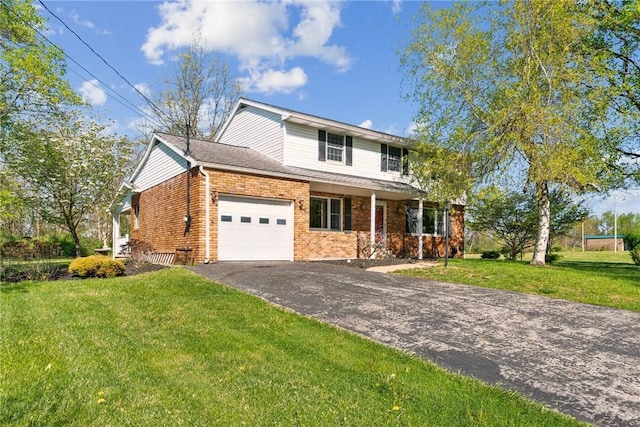 traditional-style home featuring a garage, driveway, brick siding, a front lawn, and covered porch