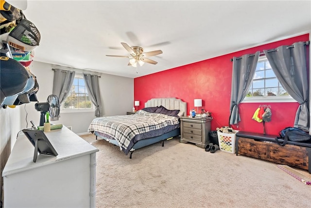 carpeted bedroom featuring ceiling fan