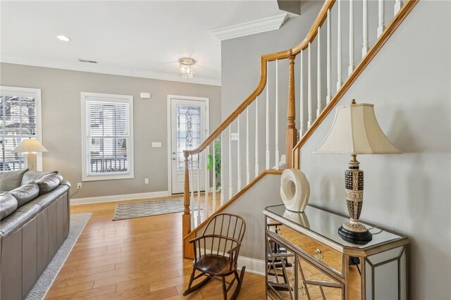 1241 Newbury Highland, South Fayette, PA 15017 - foyer entrance with crown molding, baseboards, light wood-style flooring, stairway, and recessed lighting