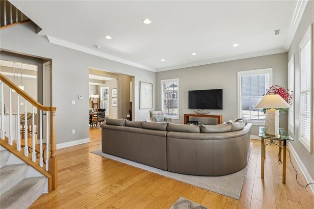 1241 Newbury Highland, South Fayette, PA 15017 - living room with light wood-type flooring, stairway, ornamental molding, baseboards, and recessed lighting