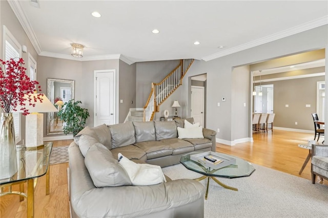 1241 Newbury Highland, South Fayette, PA 15017 - living area featuring wood finished floors, stairway, crown molding, recessed lighting, and baseboards