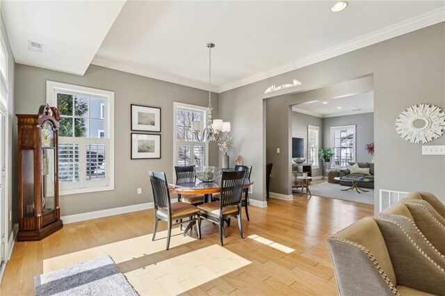 1241 Newbury Highland, South Fayette, PA 15017 - dining room with light wood-style floors, a chandelier, baseboards, crown molding, and recessed lighting
