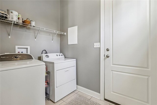 1241 Newbury Highland, South Fayette, PA 15017 - laundry room with separate washer and dryer, baseboards, and light tile patterned flooring