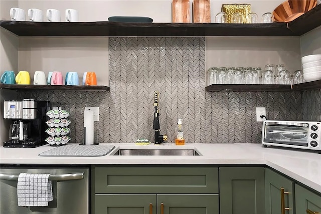 kitchen featuring green cabinets, open shelves, dishwasher, and light countertops