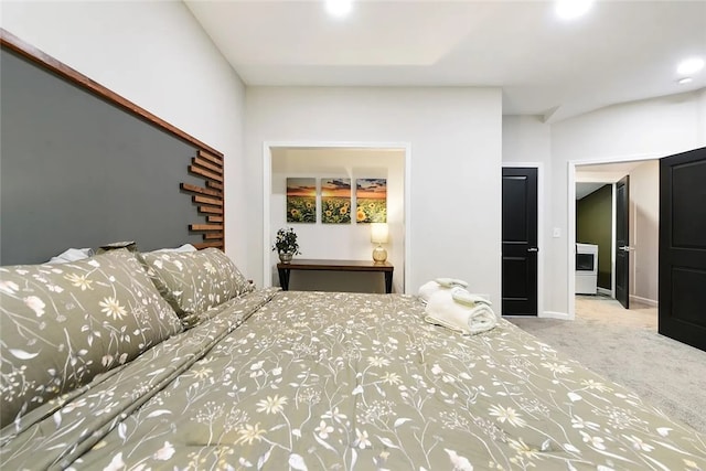 bedroom featuring carpet and baseboards