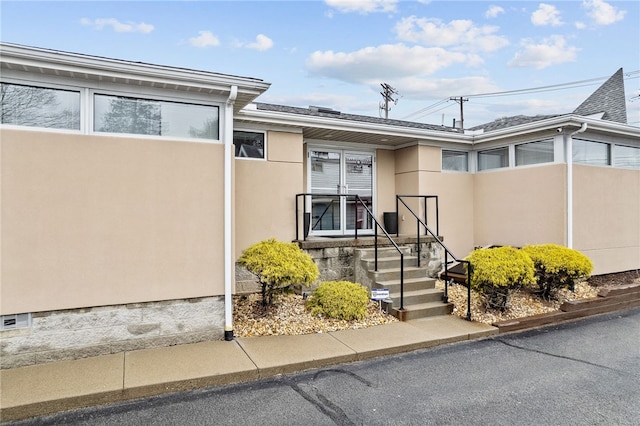 view of front of home with stucco siding