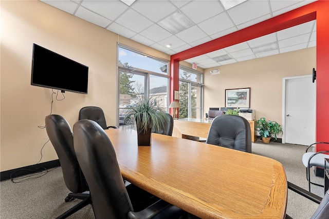office space featuring a paneled ceiling and carpet flooring