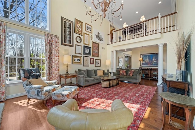 904 Champlain Pl, Adams Twp, PA 15044 - living area with a towering ceiling, wood finished floors, a chandelier, and recessed lighting