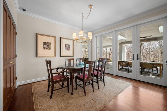904 Champlain Pl, Adams Twp, PA 15044 - dining area featuring a chandelier, crown molding, wood finished floors, baseboards, and french doors