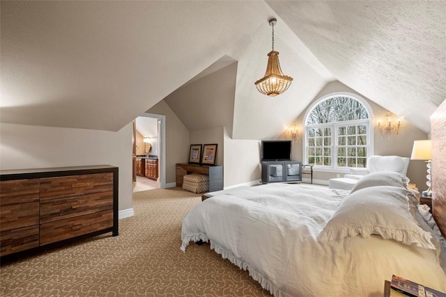 904 Champlain Pl, Adams Twp, PA 15044 - carpeted bedroom with vaulted ceiling, baseboards, a textured ceiling, and connected bathroom