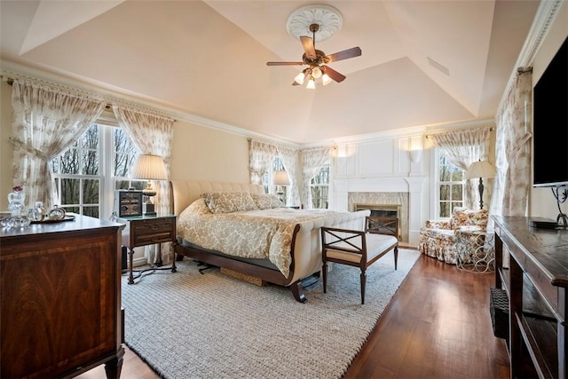 904 Champlain Pl, Adams Twp, PA 15044 - bedroom featuring multiple windows, a high end fireplace, wood finished floors, and lofted ceiling