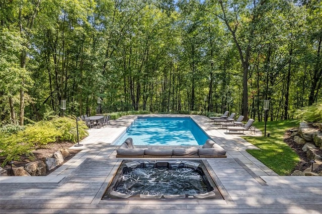 904 Champlain Pl, Adams Twp, PA 15044 - view of swimming pool featuring a deck, fence, a patio, and a forest view