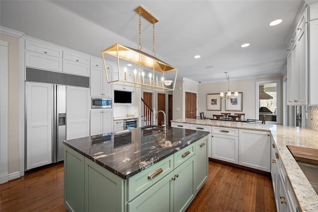 904 Champlain Pl, Adams Twp, PA 15044 - kitchen featuring built in appliances, green cabinets, a sink, crown molding, and a chandelier