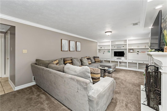 carpeted living room with crown molding, a fireplace, and baseboards