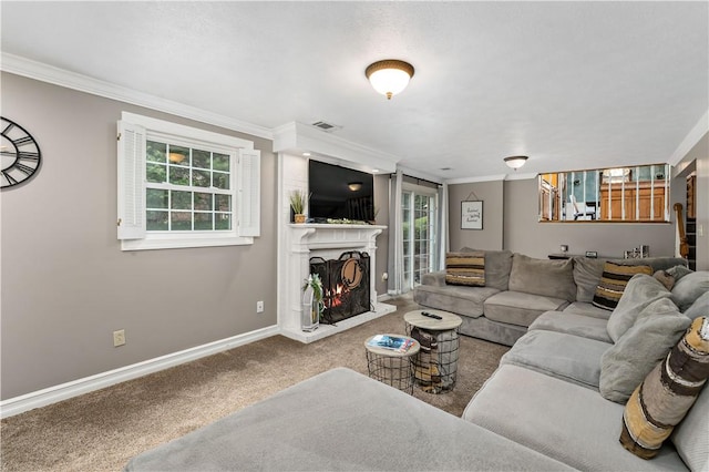 carpeted living room with ornamental molding, baseboards, and a lit fireplace