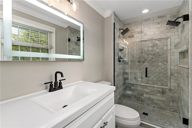 bathroom featuring a shower stall, toilet, crown molding, vanity, and recessed lighting