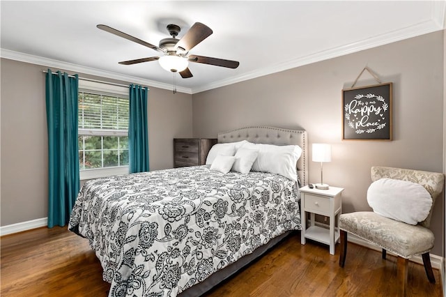 bedroom with wood finished floors, ornamental molding, baseboards, and ceiling fan