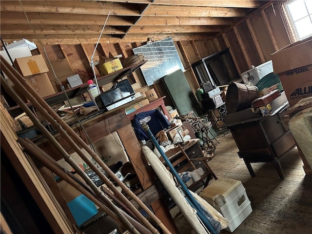 misc room with wooden walls and hardwood / wood-style floors