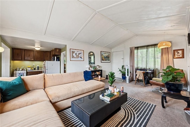 living area with lofted ceiling and carpet