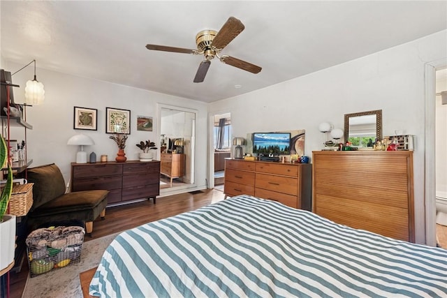 bedroom with wood finished floors and a ceiling fan