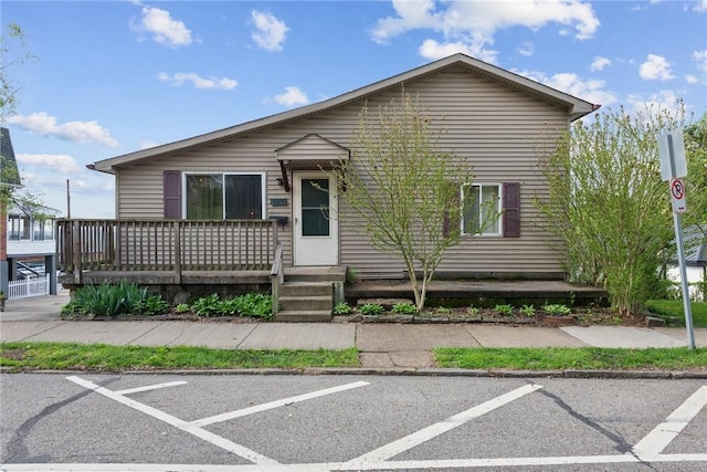view of front of home featuring uncovered parking